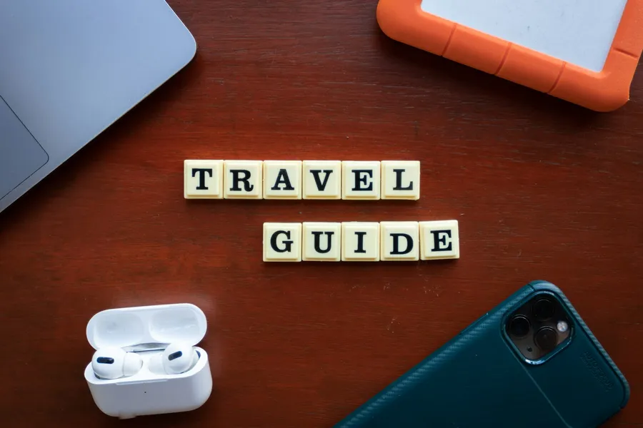 Travellers comparing notes at a hostel