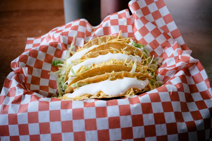Colourful Mexican street tacos with fresh toppings